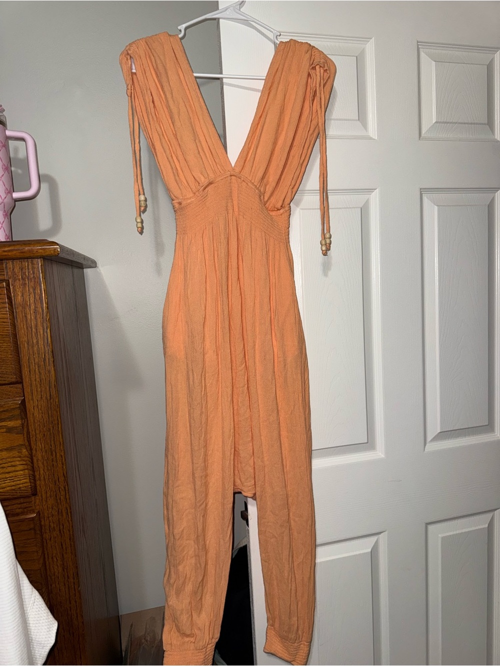 Free People Peach Orange Plunging V Jumpsuit with Tie Shoulders